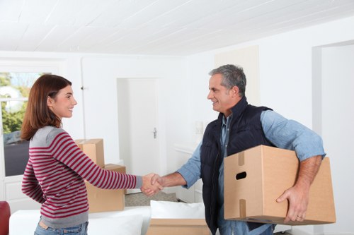 Unpacking and setting up belongings in a Catford flat