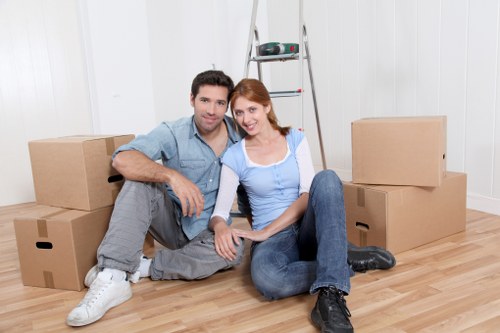 Packed boxes and household items ready for a Catford move