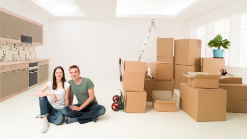 Loading furniture into a van for a Catford removal job