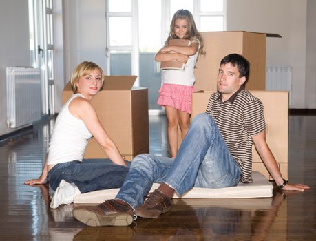 Packed boxes and furniture prepared for a Catford house move