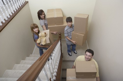Packed boxes and furniture prepared for a home move in Catford